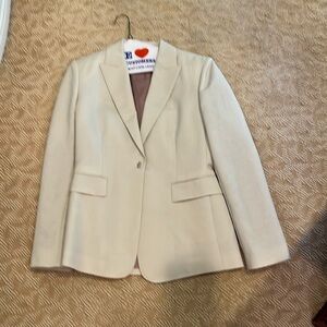 Beautiful cream colored woman’s suit